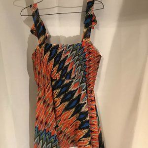 Vibrant colored top by Allen Schwartz